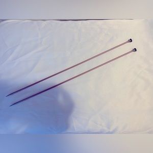 Size 4 aluminum knitting needles.